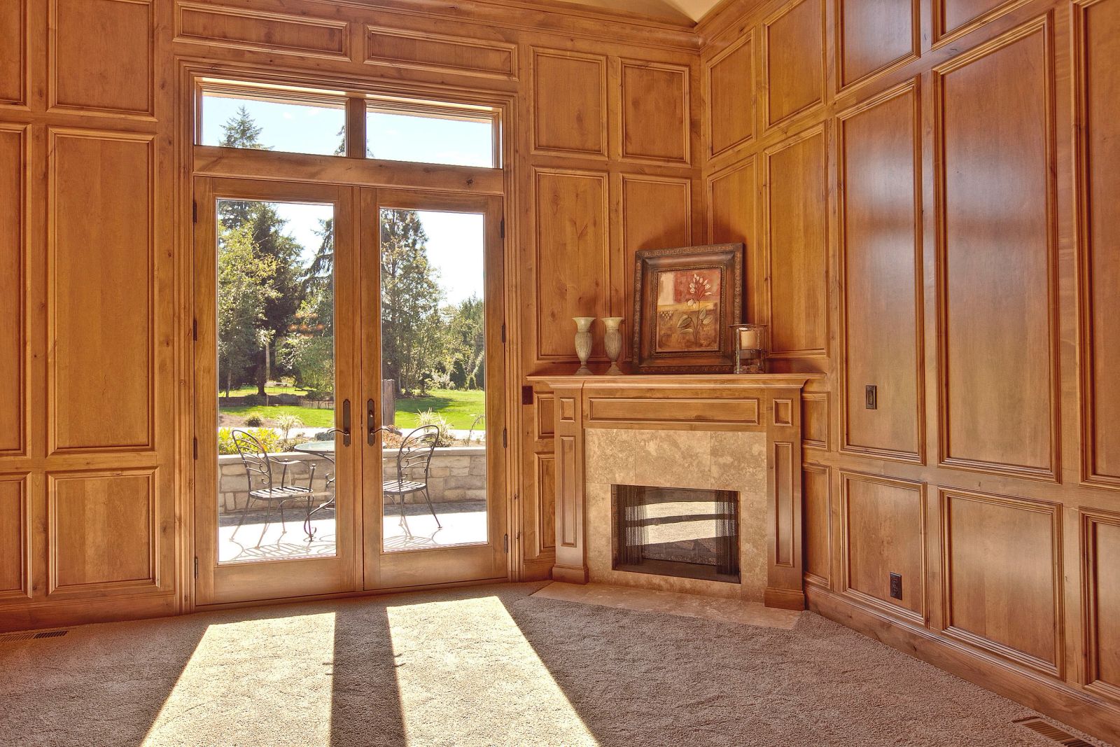 Wood-panelled den with a corner fireplace, Bear Creek custom home